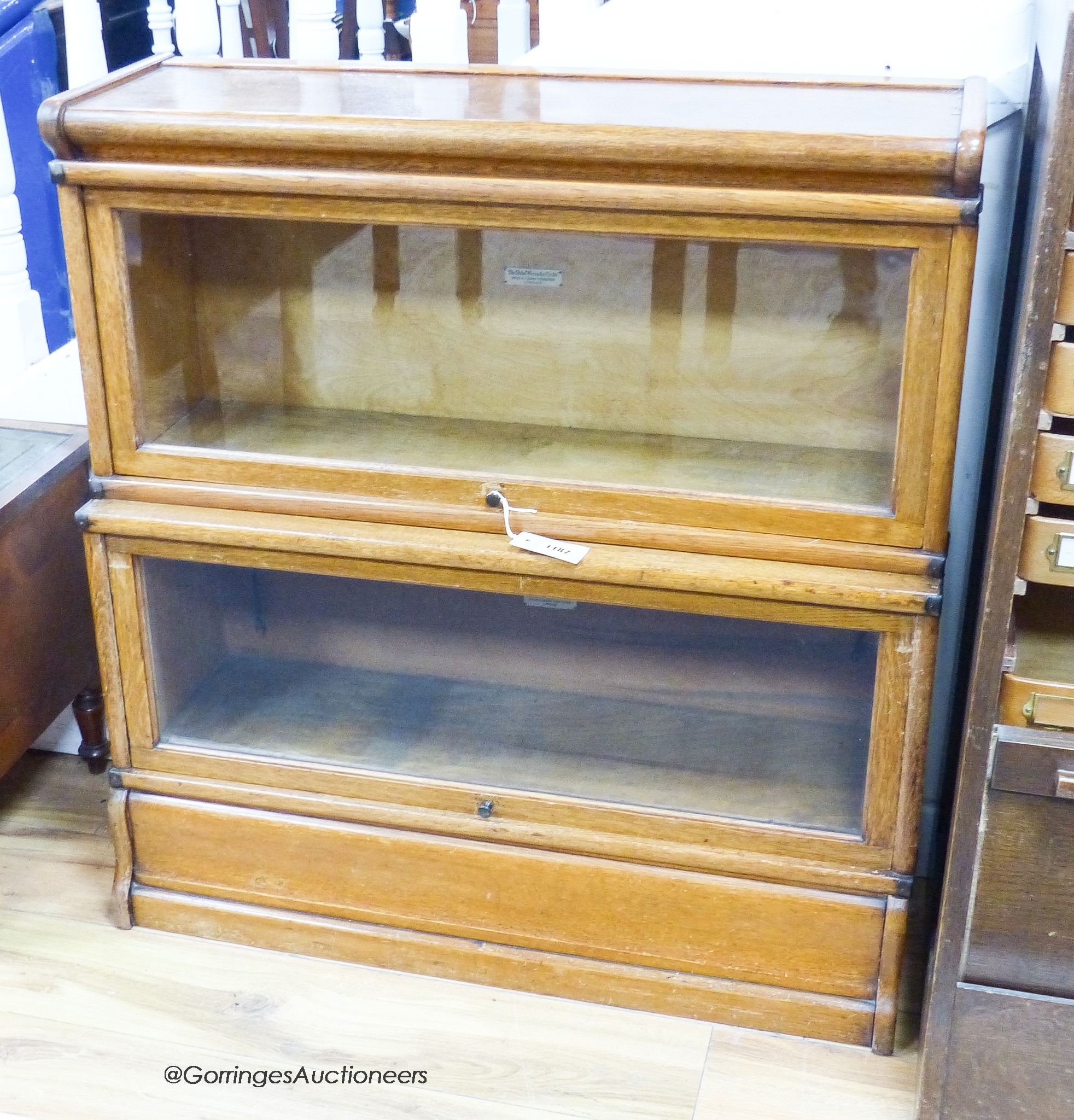 A Globe Wernicke oak two section bookcase. W-87, D-32, H-92cm.